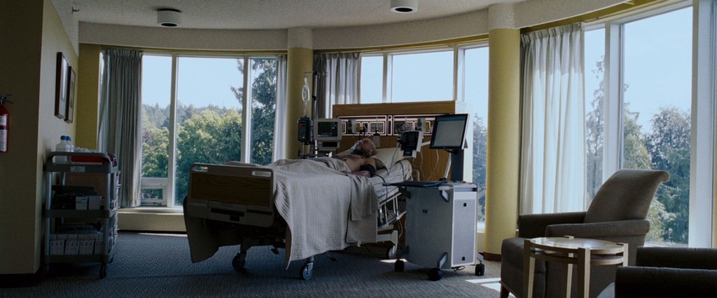 Charles Xavier's identical twin brother lies comatose in the bed of what appears to be some kind of care facility.